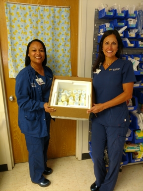 From left, North Oaks Children’s Services Clinical Nurse Manager Tamara Mitchell and Lead Lactation Consultant Tasha Daniel receive the hospital’s first shipment of pasteurized donor human milk Aug. 14. World Breastfeeding Month is observed every August.